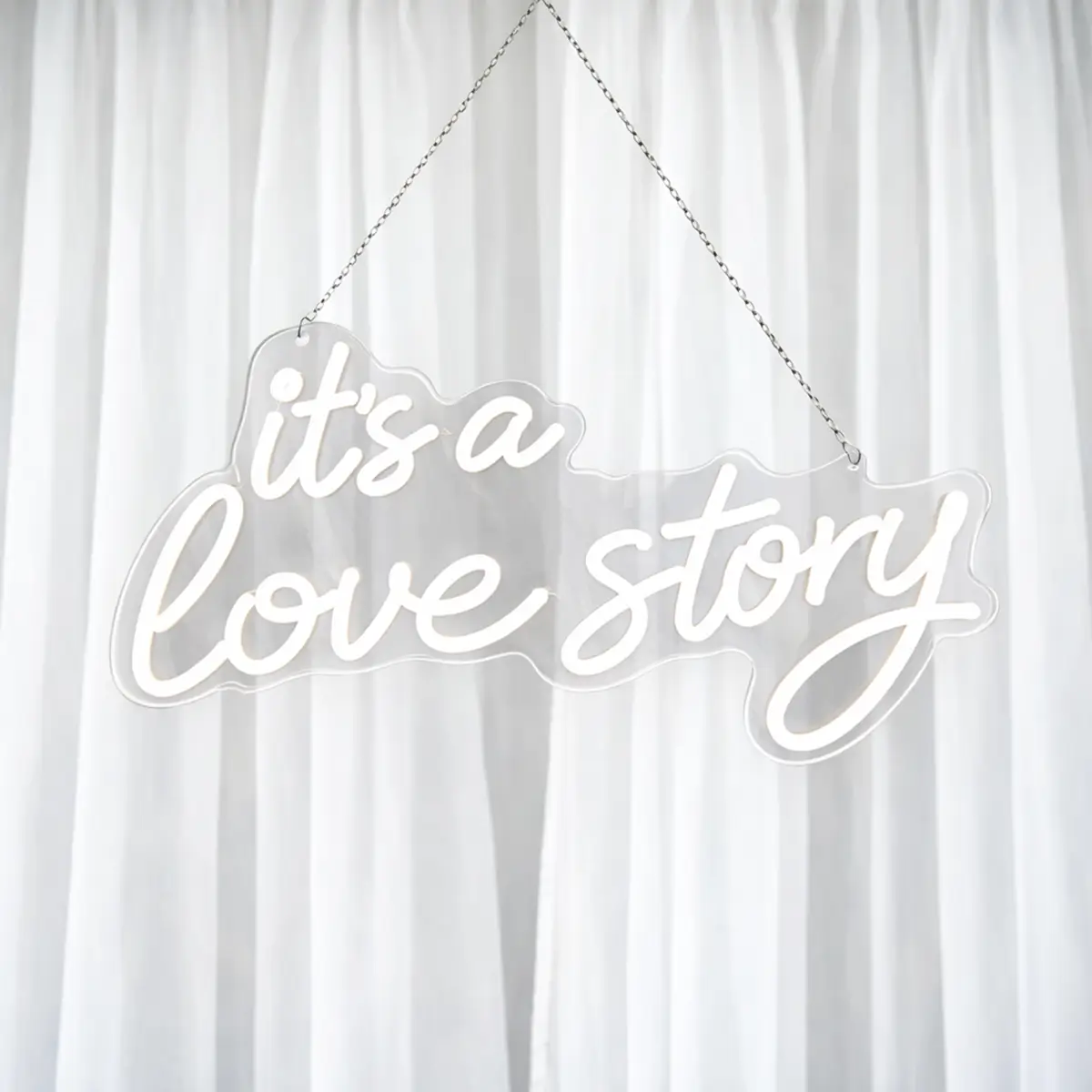 lej LED lysskilt | "It's a love story" | Varm hvid | Dæmpbart neonskilt